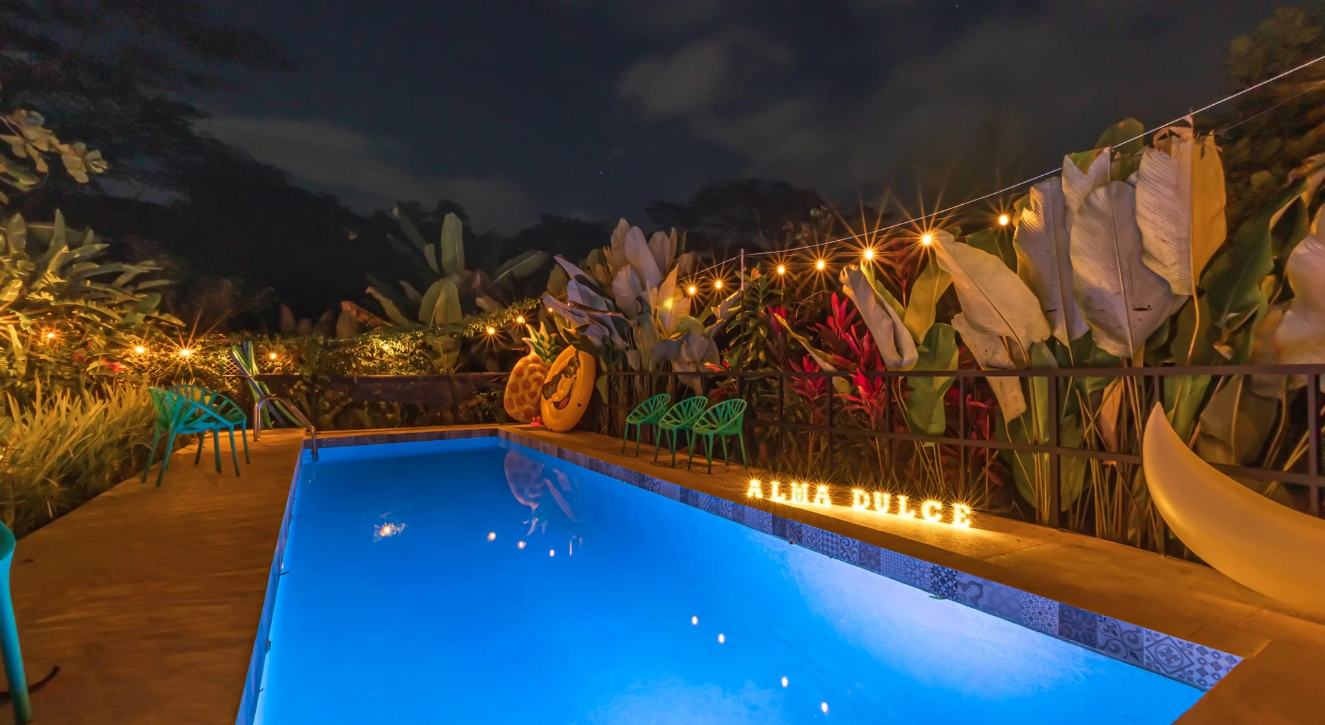Group of women enjoying a waterfall pool together in the Costa Rican jungle